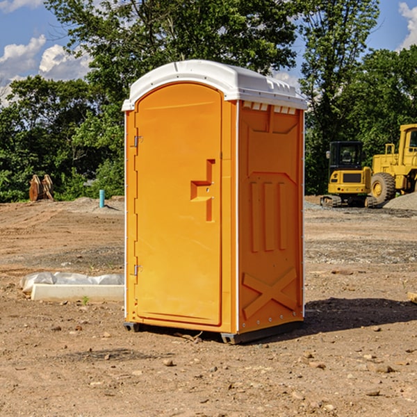 how often are the portable restrooms cleaned and serviced during a rental period in Athena OR